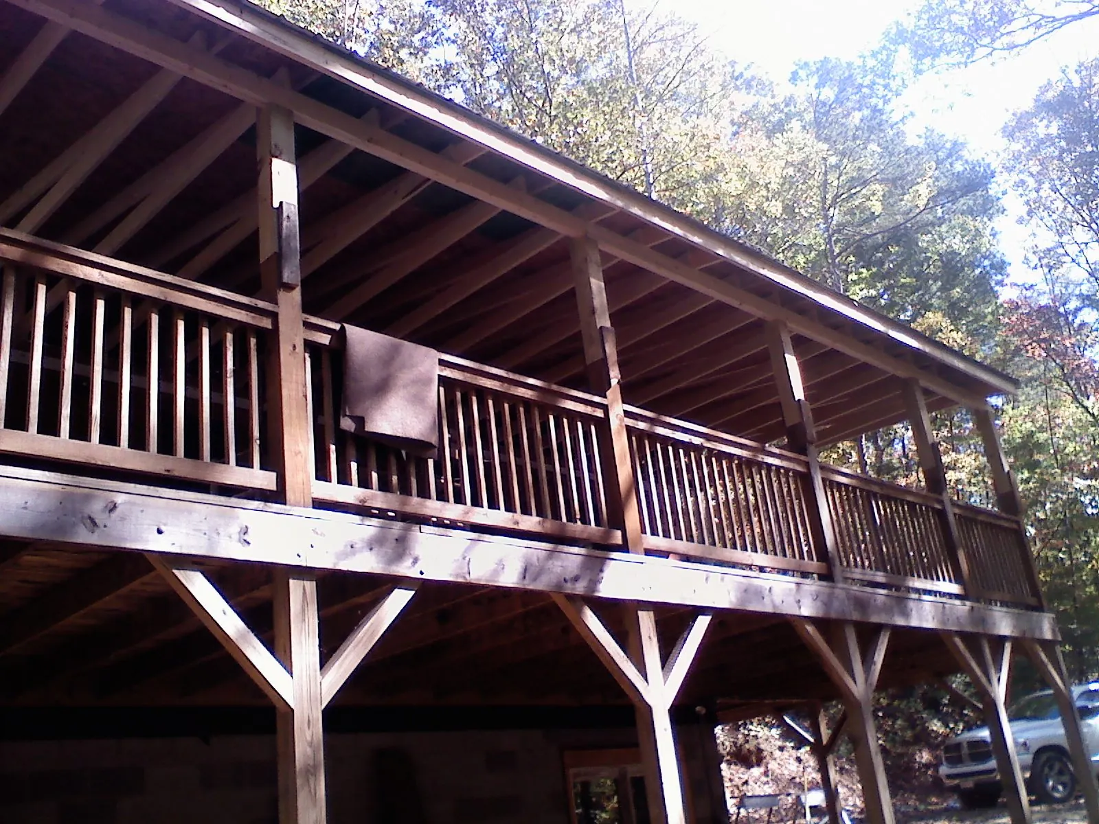 Timber framing under a new elevated porch and deck — Roof Leak Repair in Westport Point by Roofing Brothers